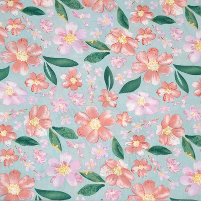 Pretty coral coloured flowers are printed on a mint coloured woven viscose fabric.