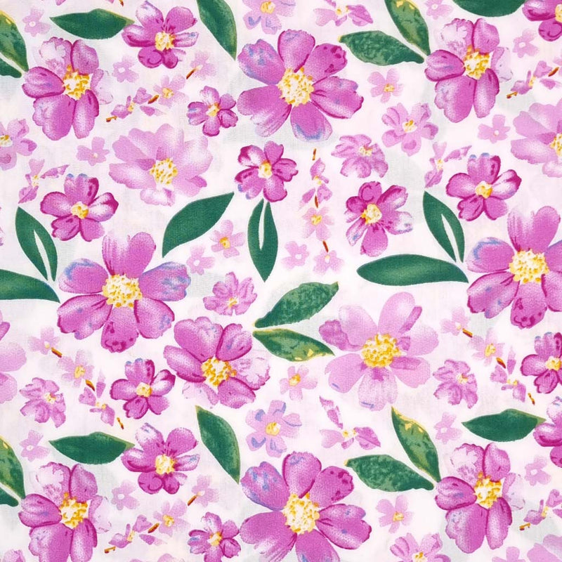 Pretty lilac coloured flowers are printed on an ivory woven viscose fabric.
