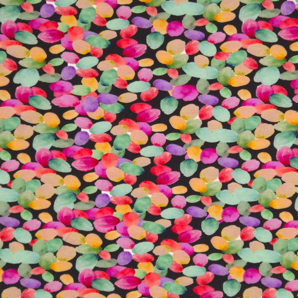 Colourful spots printed on a black viscose jersey fabric