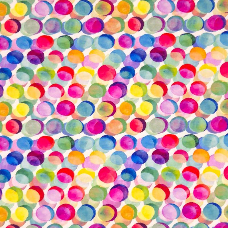 Watercolour painted colourful spots printed on a viscose jersey fabric