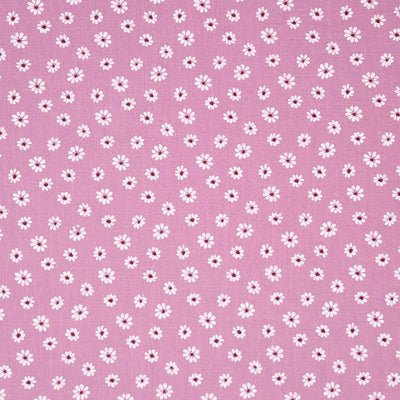 Vintage daisies printed on a dusky pink washed cotton fabric