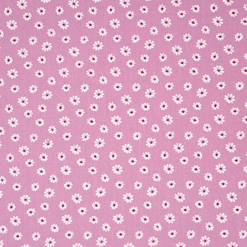 Vintage daisies printed on a dusky pink washed cotton fabric