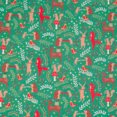 A collection of dancing forest animals enjoying a festive Christmas party, printed on a green polycotton fabric. Features rabbits, foxes, hedgehogs, robins and even a tiny mouse. 