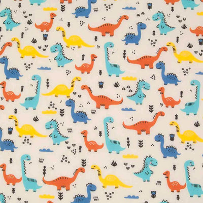 Yellow, turquoise, orange and blue happy dinosaurs printed on a cream polycotton fabric.