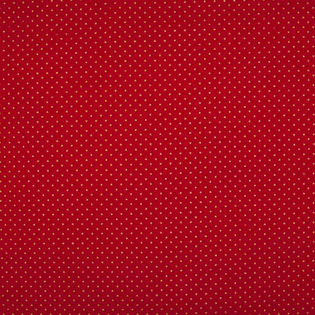2mm gold lacquer pin spots are printed on a red cotton christmas fabric