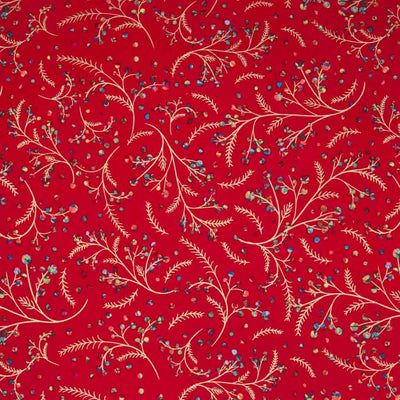 Rainbow coloured holly berries on festive branches printed on a red cotton fabric