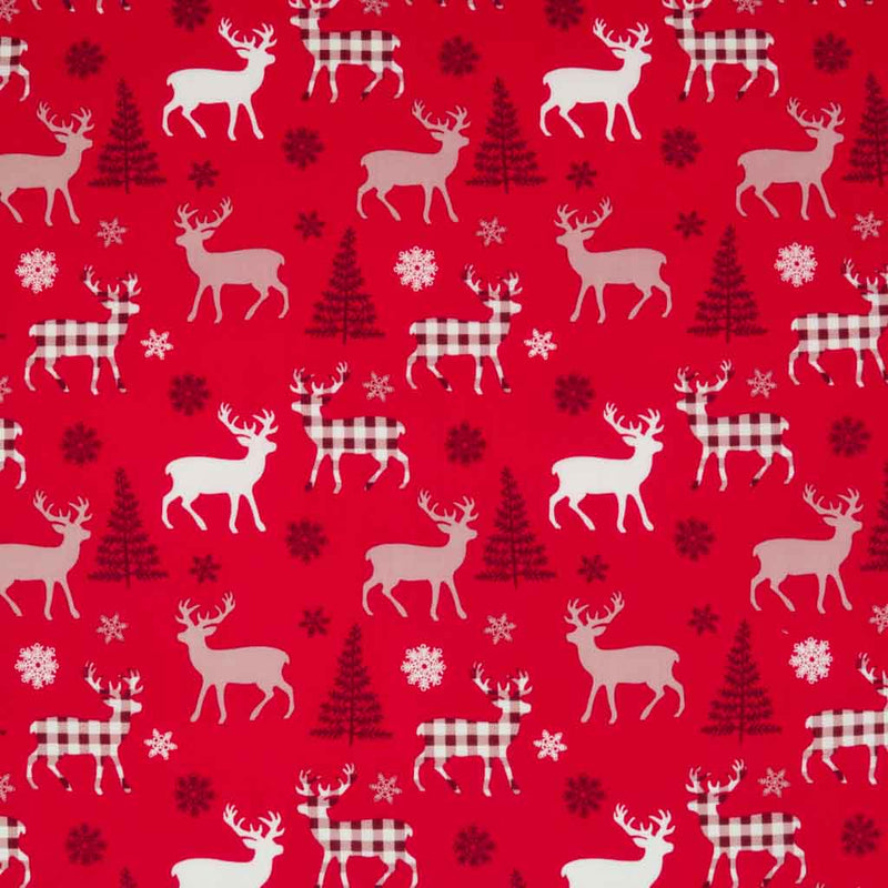 Ivory and red check reindeer on a  100% cotton, red  fabric.