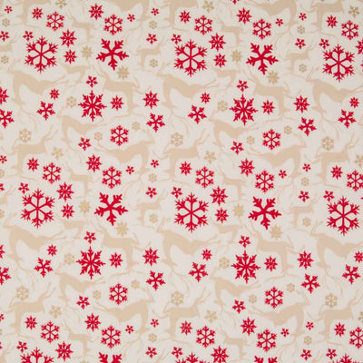 Light beige reindeer, deep red stars and gold glitter stars are printed on an ivory, 100% cotton fabric