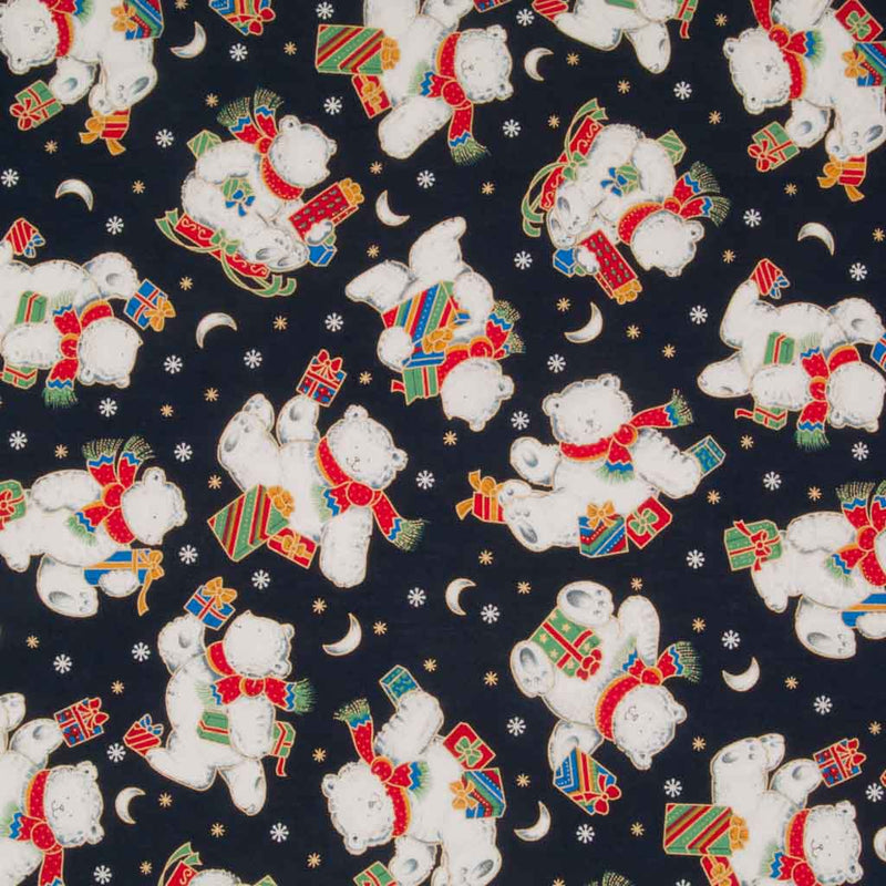 Festive teddies holding christmas gifts are printed on a navy 100% cotton fabric by Rose & Hubble