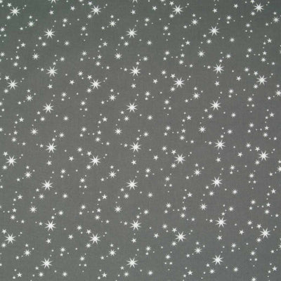 White christmas stars printed on a grey polycotton fabric.