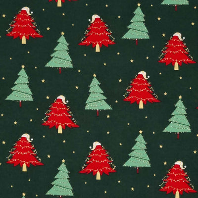 Red and green Christmas trees with metallic gold fairy lights and stars printed on a bottle green 100% quality cotton fabric by Rose & Hubble.