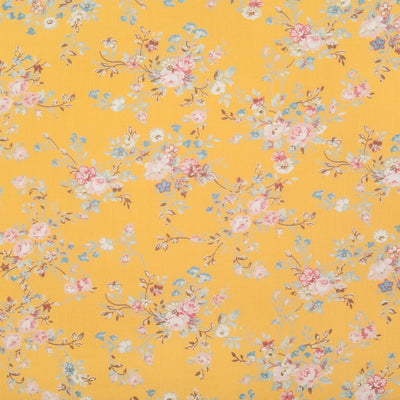 A beautiful, delicate floral print by Rose and Hubble printed on lemon yellow cotton poplin fabric