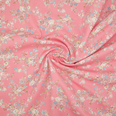 A beautiful, delicate floral print by Rose and Hubble printed on Rose Pink cotton poplin fabric with swirl for drape perspective