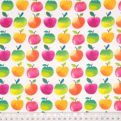 Bright colourful apples are digitally printed on a quality white 100% cotton fabric with a cm ruler