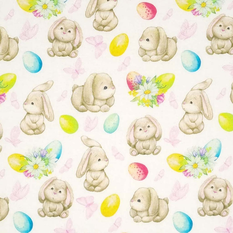 Cute easter bunnies with colourful easter eggs are printed on a quality white 100% cotton fabric. 