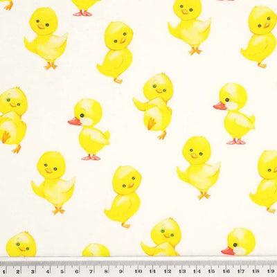 Cute easter chicks are printed on a quality white 100% cotton fabric with a cm ruler