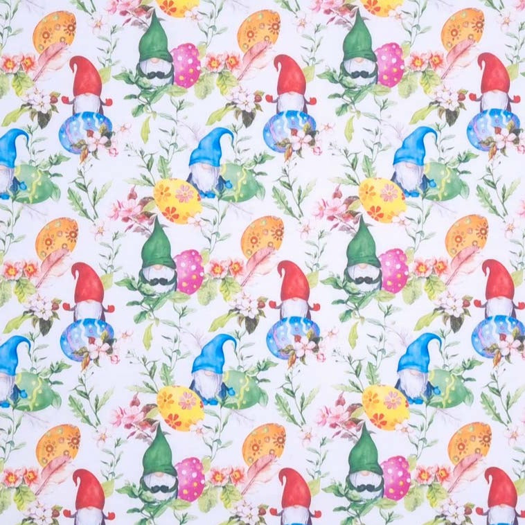 Colourful easter eggs and gnomes printed on a white cotton fabric by Rose & Hubble