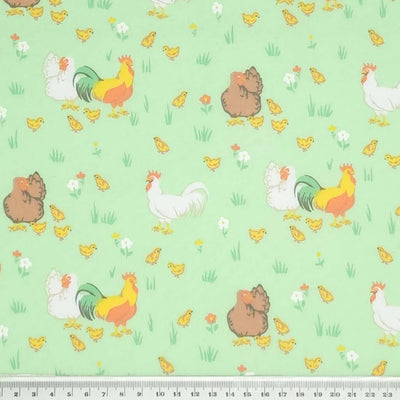Rooster, hens and chicks complete the chicken family in this classic spring time design. Printed on a pastel green quality polycotton fabric with a cm ruler