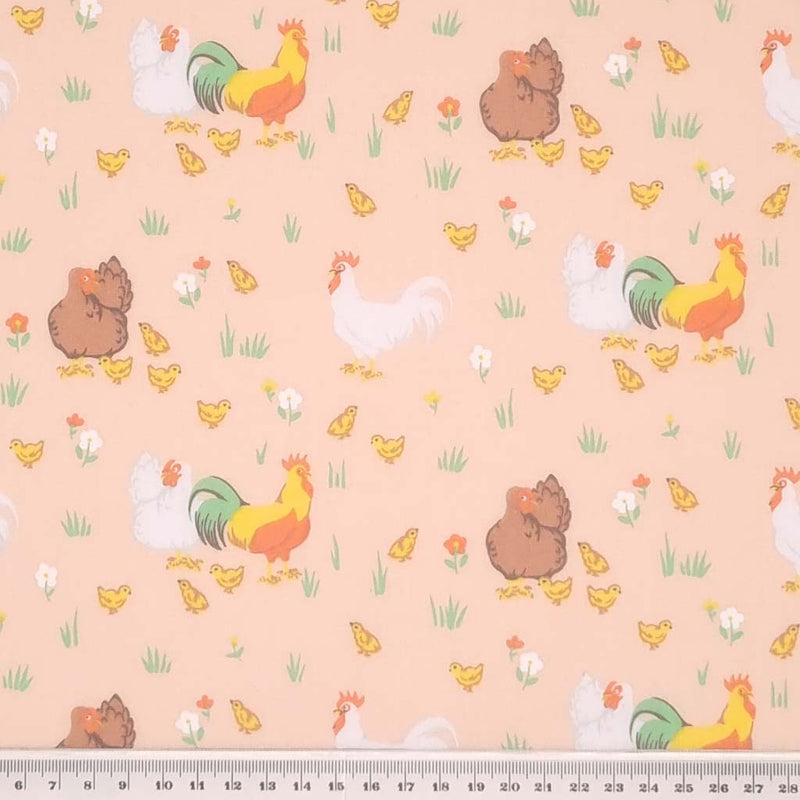 Rooster, hens and chicks complete the chicken family in this classic spring time design. Printed on a pastel peach, quality polycotton fabric with a cm ruler