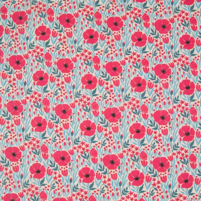 Small red poppies with teal coloured foliage are printed on a cream polycotton fabric
