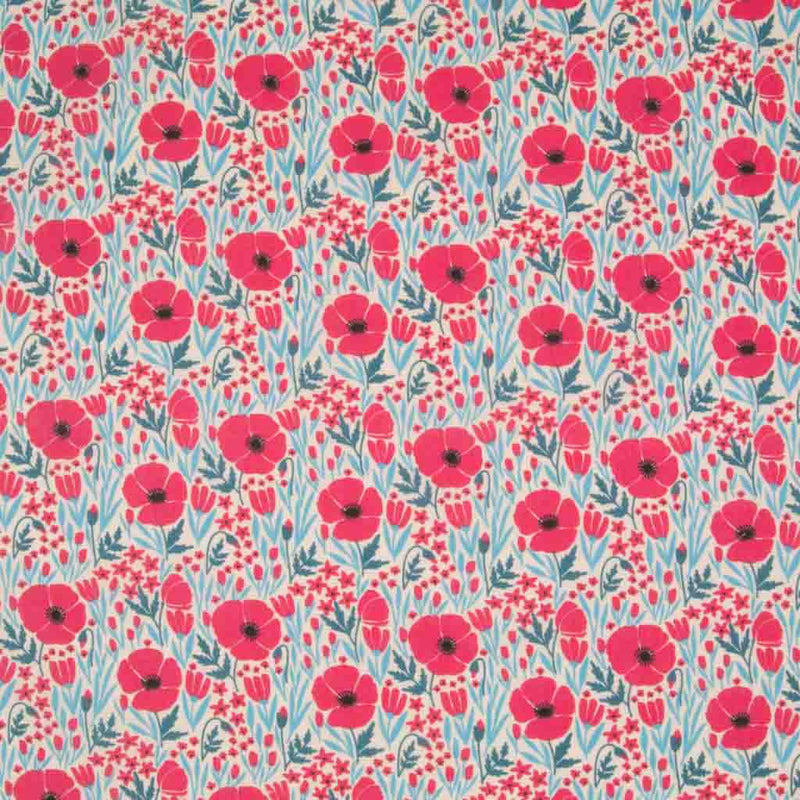 Small red poppies with teal coloured foliage are printed on a cream polycotton fabric