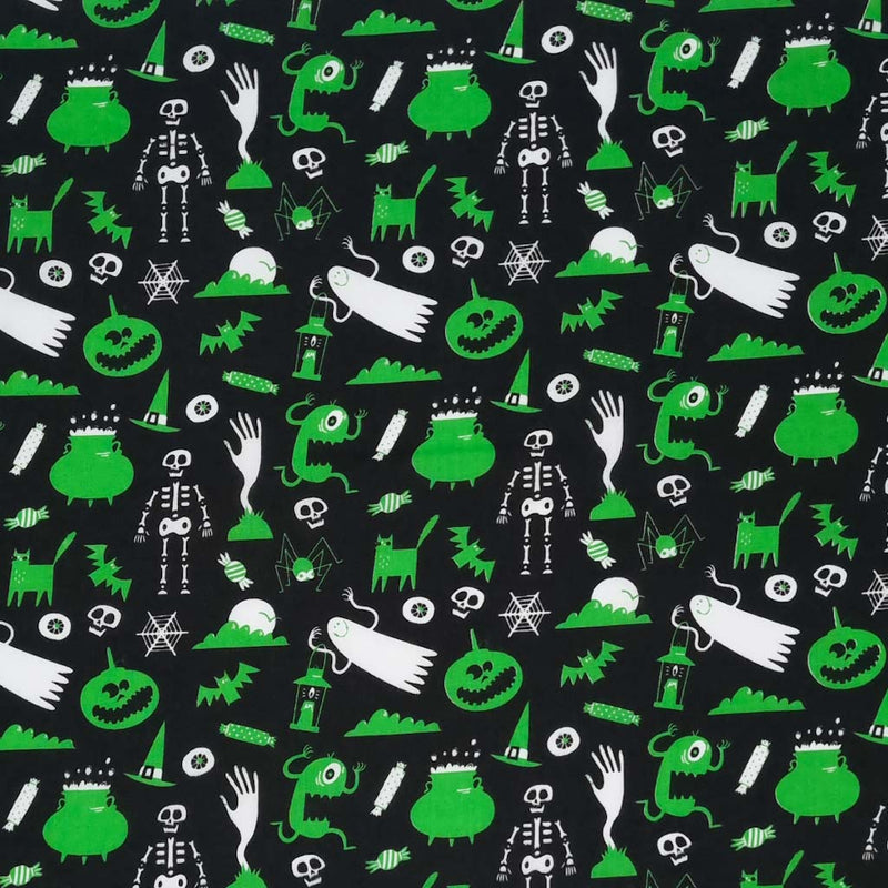 Halloween fabric printed with ghosts and ghouls 