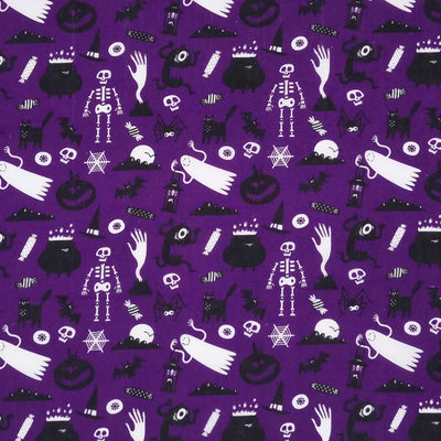 Halloween fabric printed with ghosts and ghouls on a purple polycotton