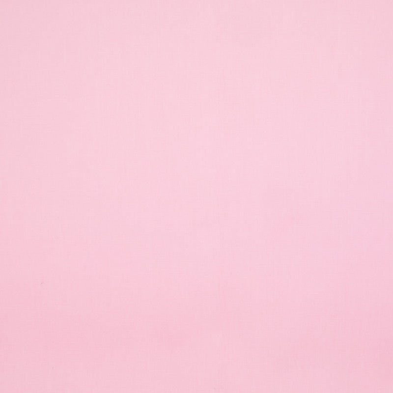 A pale pink plain cotton poplin fabric