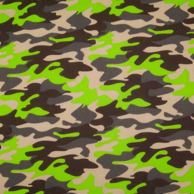 A camouflage design in beige, brown and green on a polycotton fabric