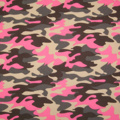 A camouflage design in beige, brown and hot pink on a polycotton fabric