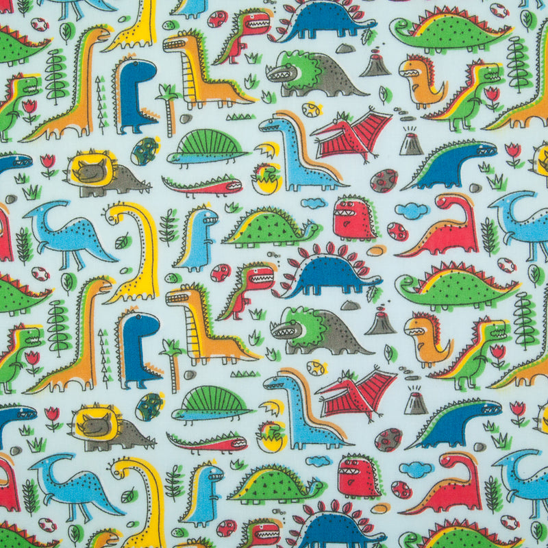 colourful cartoon dinosaurs printed on a blue polycotton fabric