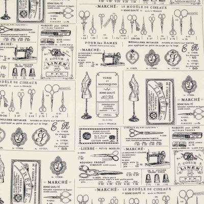 A french vintage sewing print featuring mannequins and dressmaking scissors on an ivory cotton fabric
