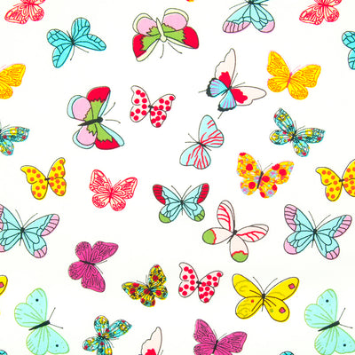 Brightly coloured Butterflies printed on cotton poplin fabric by Rose and Hubble