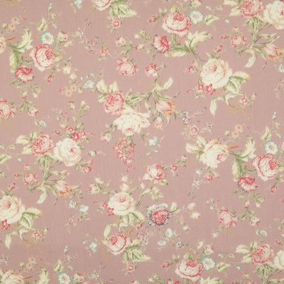 A floral pattern of pink and pale roses on a fat quarter of Rose & Hubble cotton poplin fabric