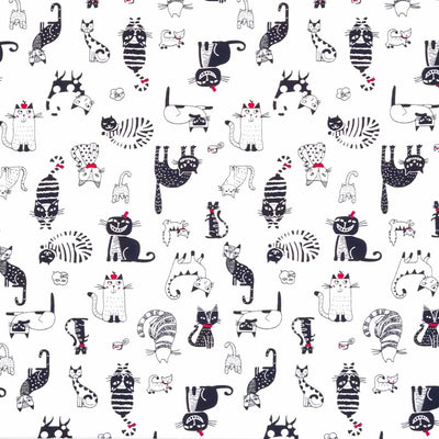 Black and white cats printed on a Rose & Hubble cotton poplin fabric