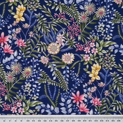 A stunning Rose & Hubble floral design with anemone florals on a navy blue, 100% cotton poplin fabric with a cm ruler
