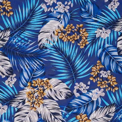 A Rose & Hubble floral design with tropical palm leaves on a blue, 100% cotton poplin fabric