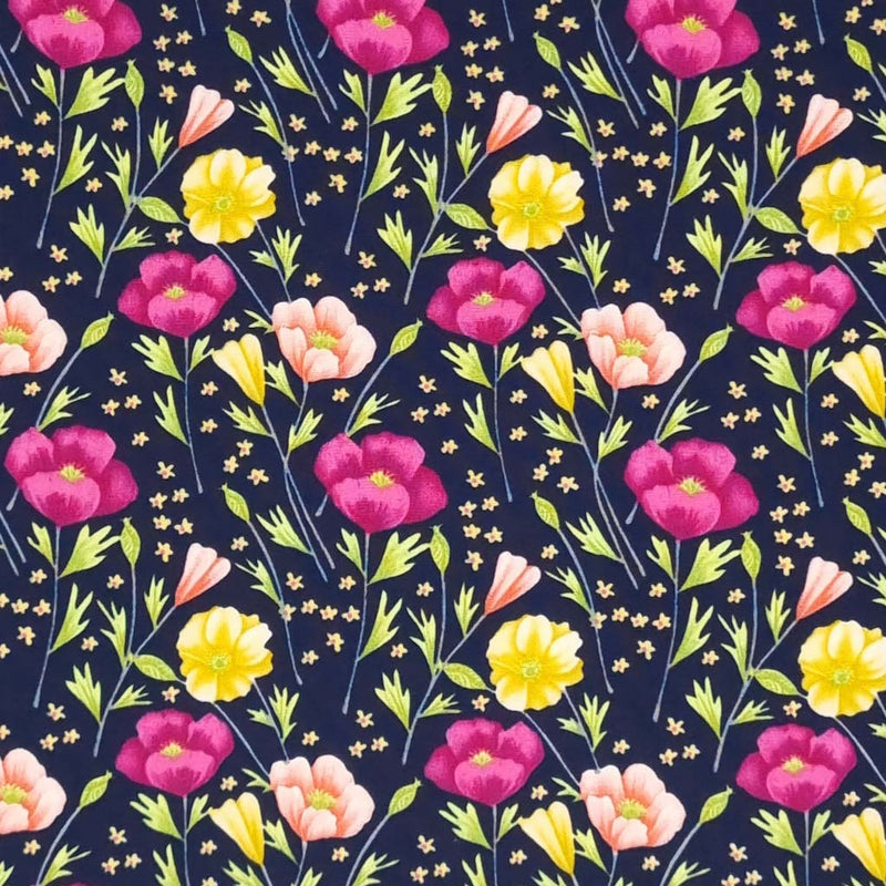Pretty deep cerise poppies and yellow crocus are printed on a navy cotton poplin fabric by Rose & Hubble