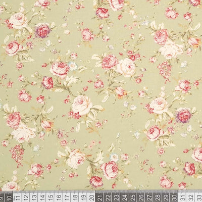 Green vintage floral printed on a cotton poplin fabric