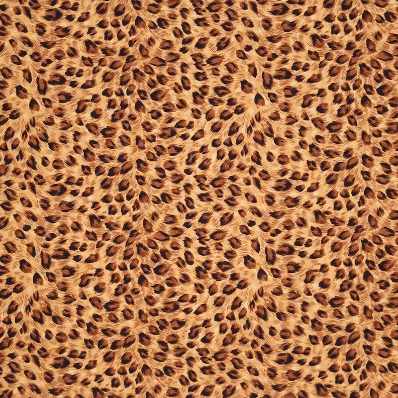 An animal print in natural tones on a 100% cotton poplin fabric by Rose & Hubble