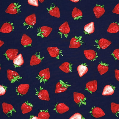 Juicy red strawberries printed on a navy cotton poplin by Rose & Hubble