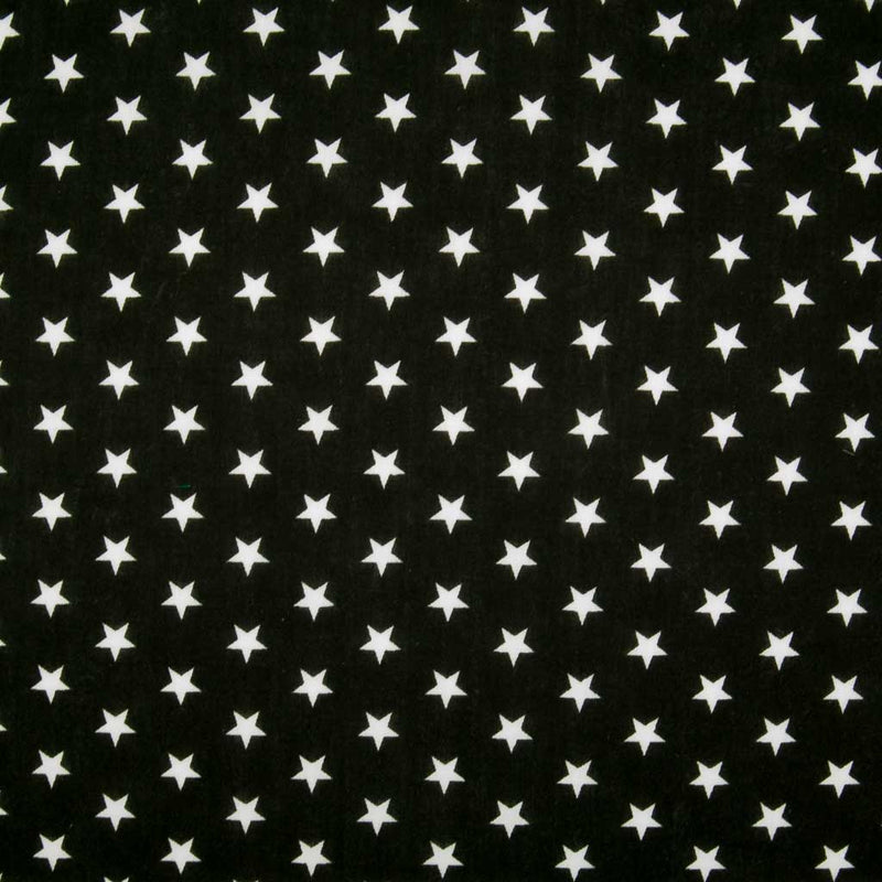 10mm white stars are printed on a black polycotton fabric
