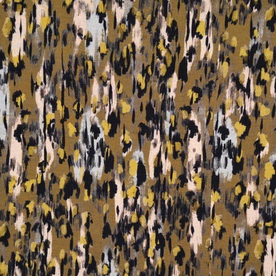An animal skin print in a pickle colourway printed on a viscose jersey fabric