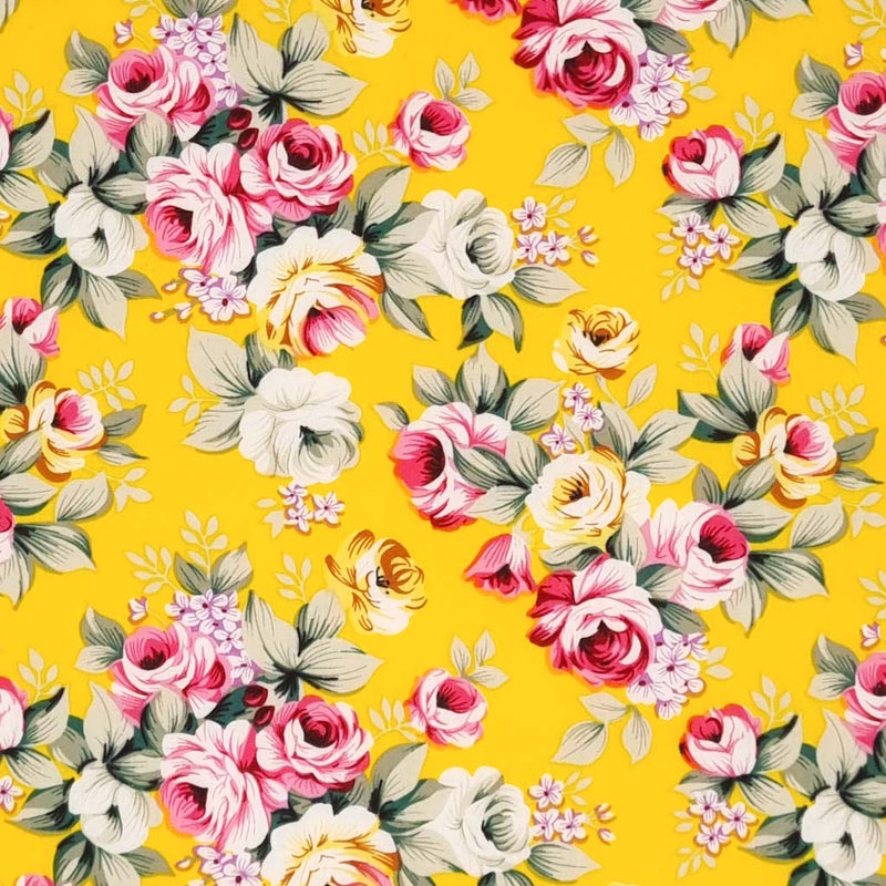 Sprays of pink roses with sage green leaves printed on a yellow, lightweight cotton poplin fabric