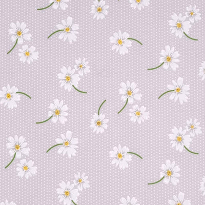 White daisies in a scattered pattern are printed on a silvery grey/lilac polycotton fabric with tiny white spots