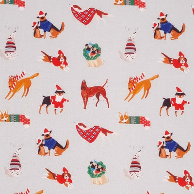 Festive dogs printed on a silver cotton christmas fabric