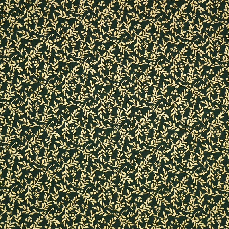 Printed gold metallic wreath leaves and flowers are printed on this green 100% cotton fabric