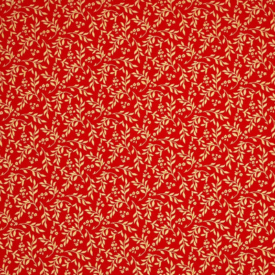 Printed gold metallic wreath leaves and flowers are printed on this red 100% cotton fabric