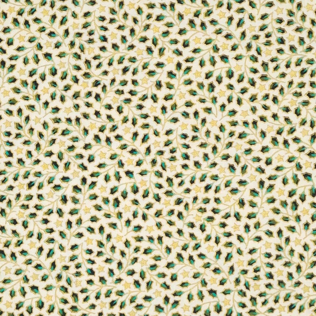 Mini holly leaves and stars in gold lacquer printed on an ivory christmas cotton fabric