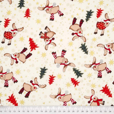Cute , smiling reindeer wearing colourful scarves and santa hats and metallic stars and hearts are printed on this ivory, cotton fabric by Rose & Hubble with a cm ruler